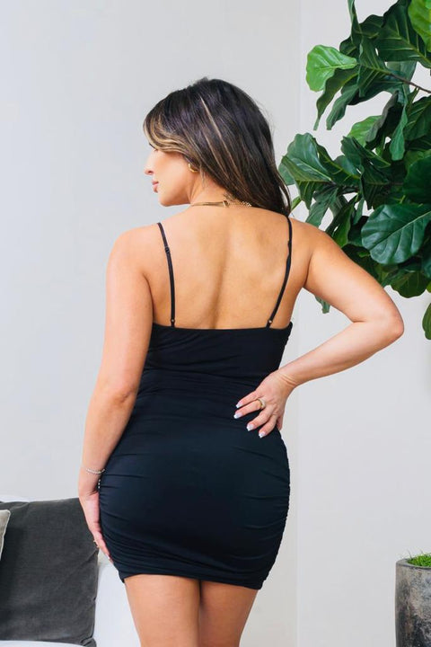 Spaghetti Strap Plunge V Neck Mini Dress with under Bust Cut Out & Tulip Wrap Skirt in Black (G0Y1061) - Wholesale Fashion Couture 