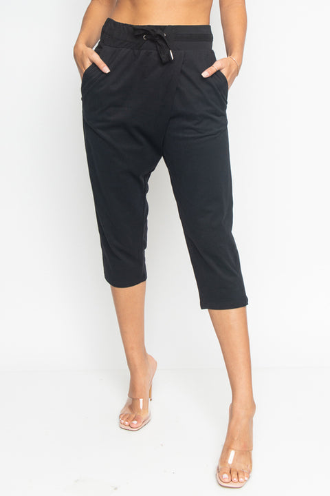 Cropped Sweat Pants with Asymmetrical Seam, Tummy Control Elastic Waistband and Front & Back Cargo Pockets (HA53365) - Wholesale Fashion Couture 