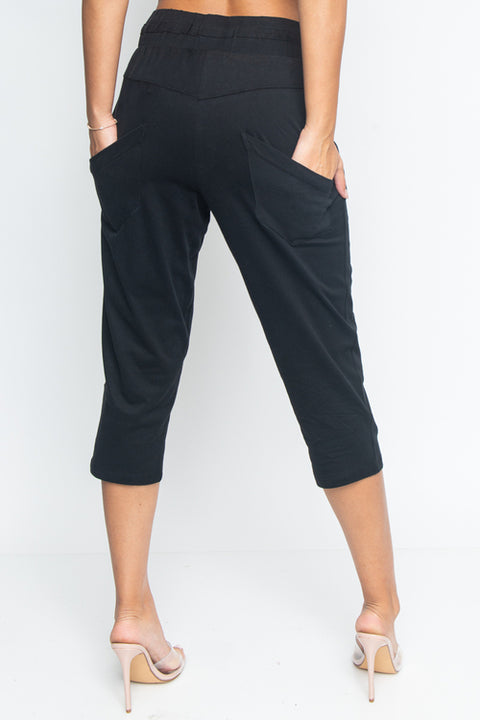 Cropped Sweat Pants with Asymmetrical Seam, Tummy Control Elastic Waistband and Front & Back Cargo Pockets (HA53365) - Wholesale Fashion Couture 